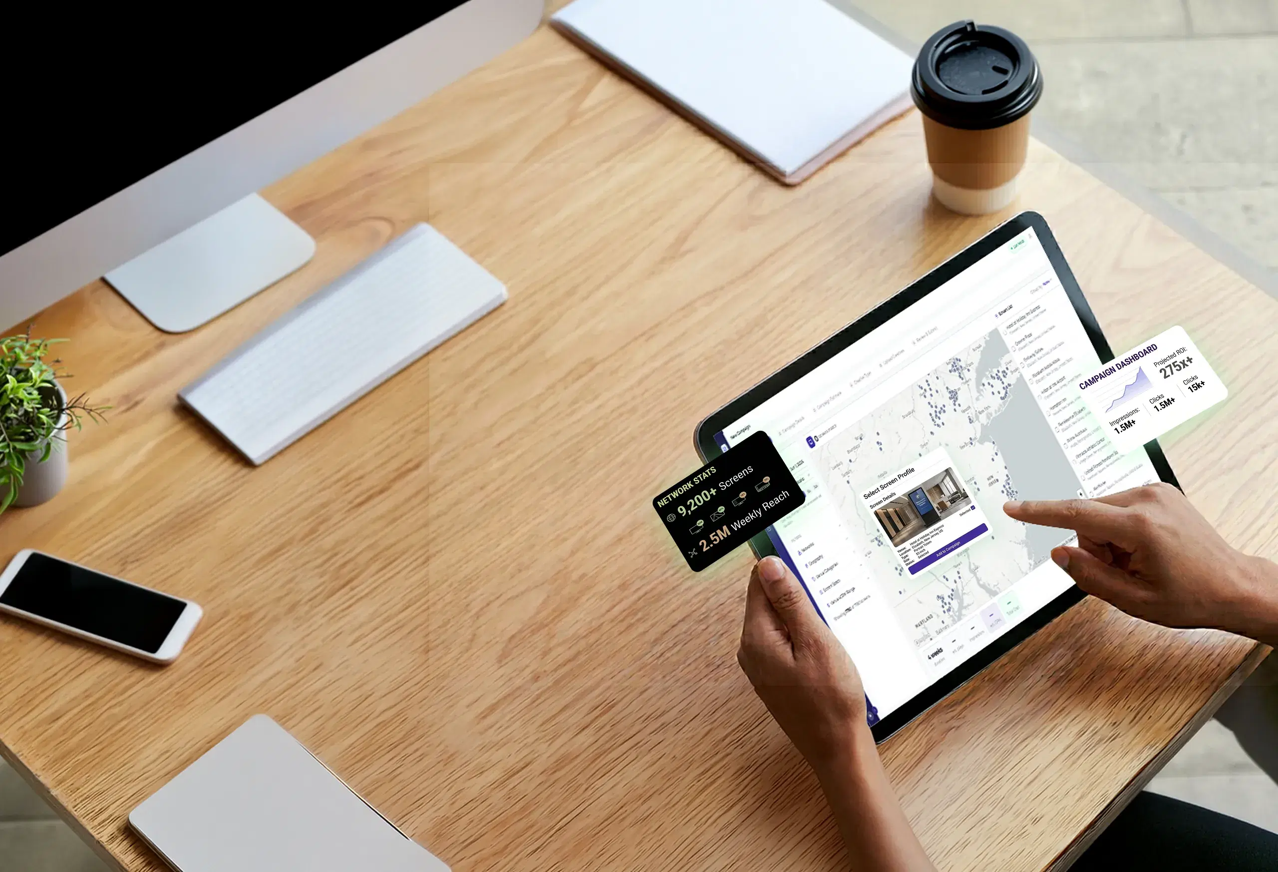 Booking an out-of-home ad campaign on a tablet showing the AdSpace screen map and impression stats